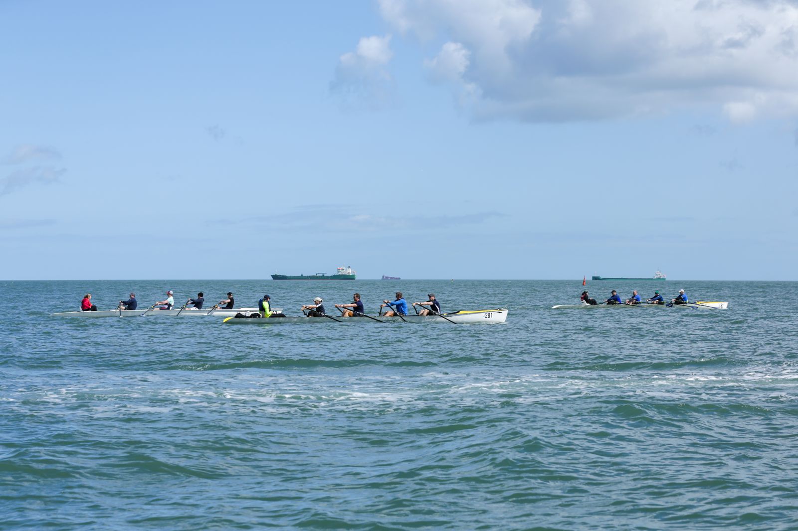 Coastal rowing quads racing on Dublin Bay