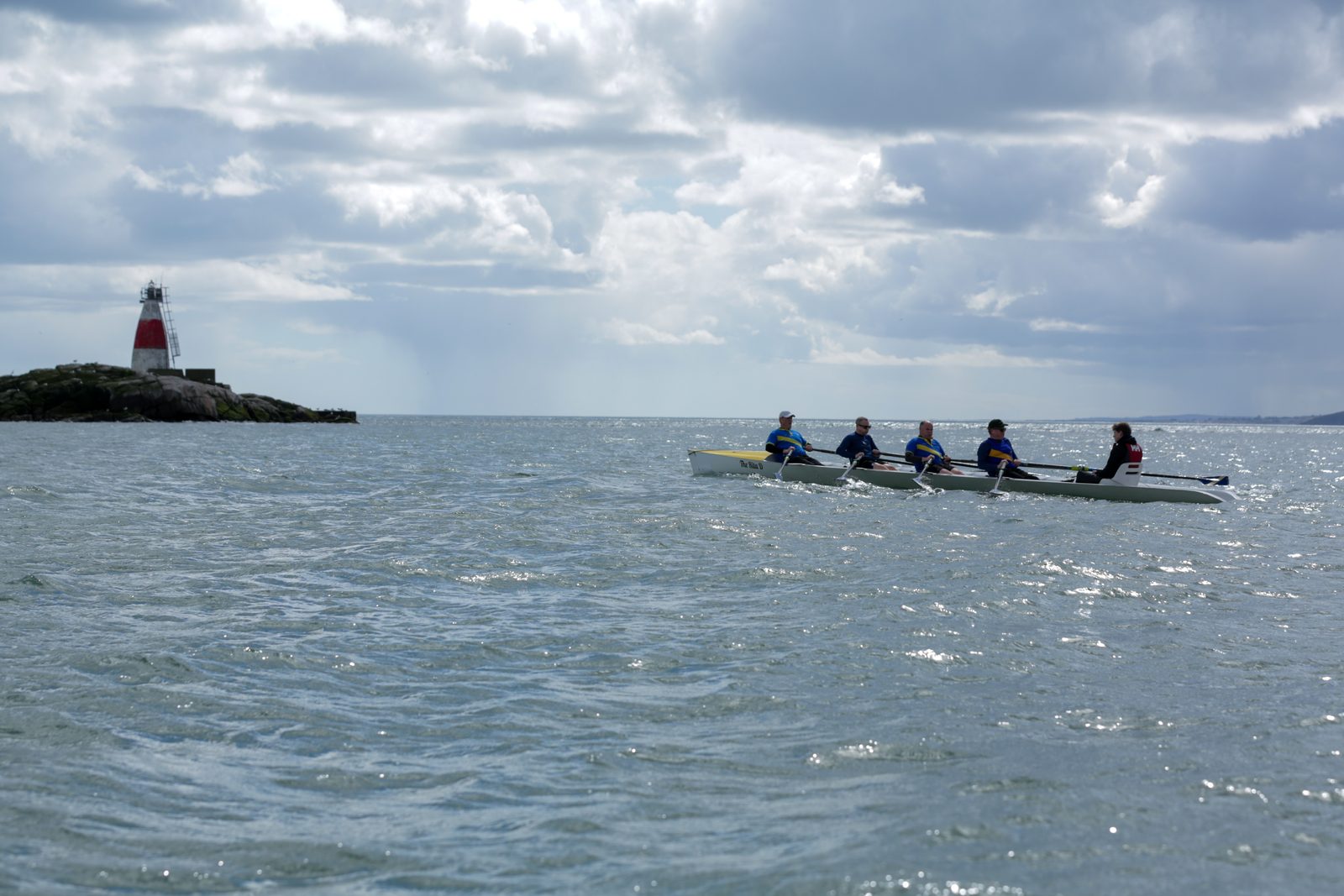 Old Collegians Boat Club crew on the outward leg to the Muglins
